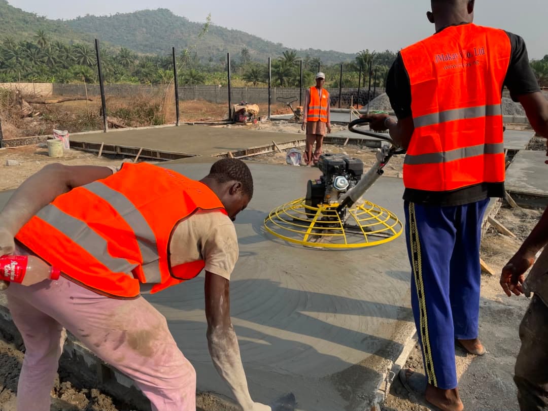 JMakay crew finishing a concrete slab on site